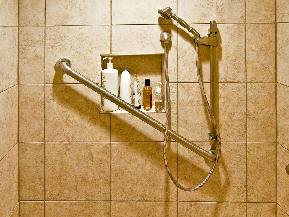 An image of grab bars in a shower.